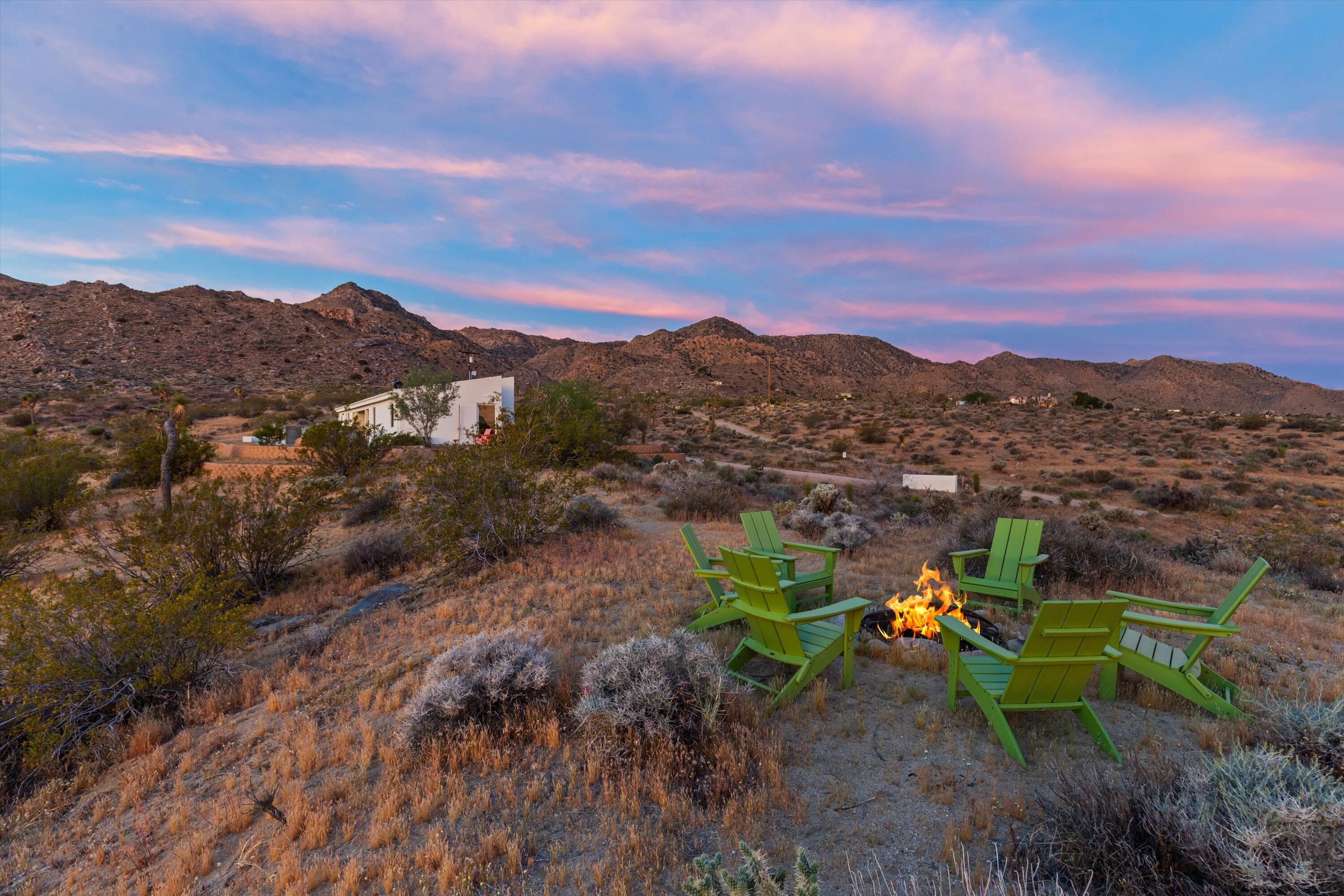 8825 Lilley Road Joshua Tree, CA 92252 - Photo 43 of 56 a view of a town with mountains in the background