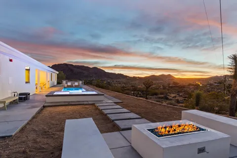 a view of house with mountain view