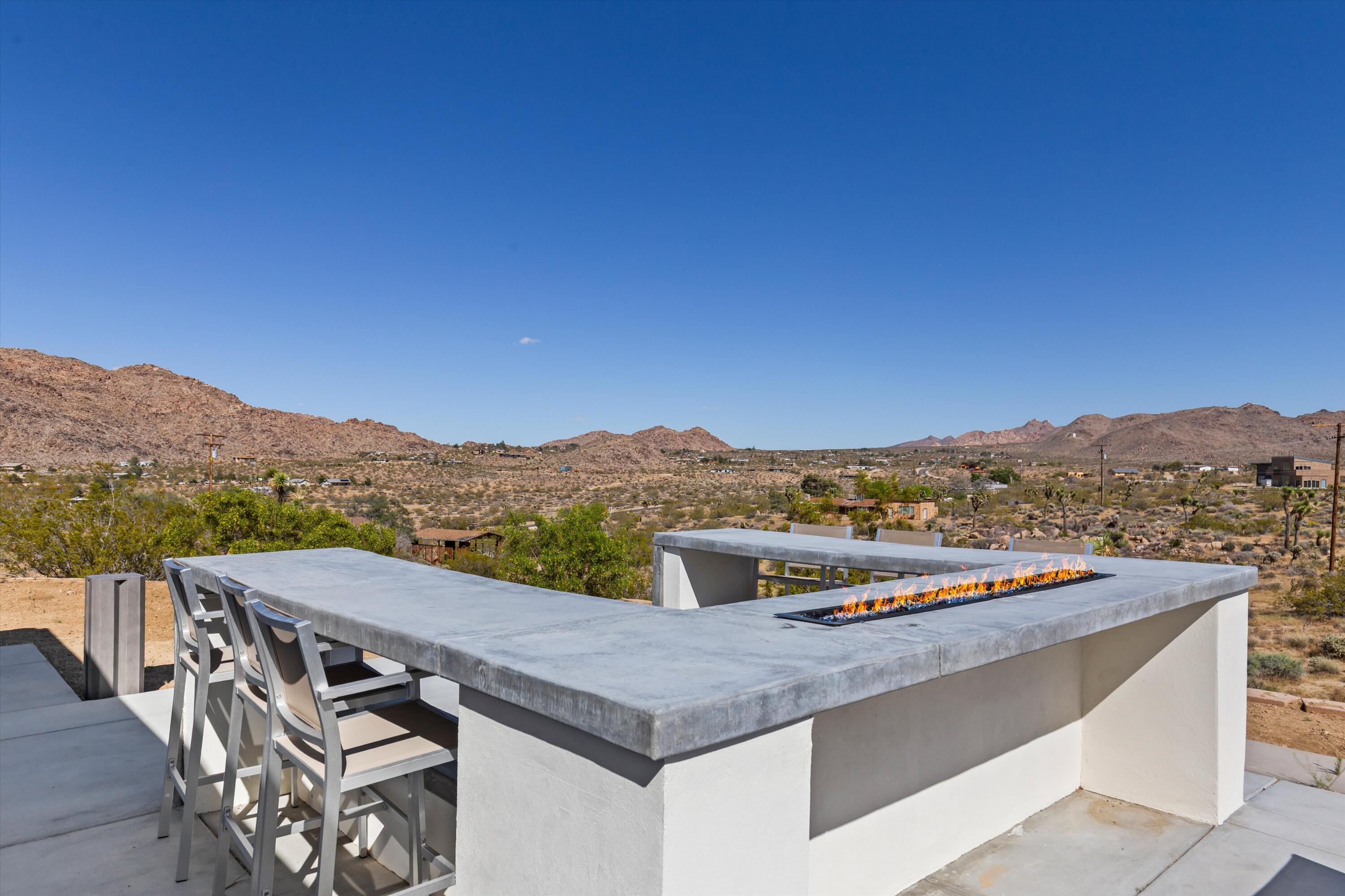 8825 Lilley Road Joshua Tree, CA 92252 - Photo 49 of 56 a view of a terrace with a mountain