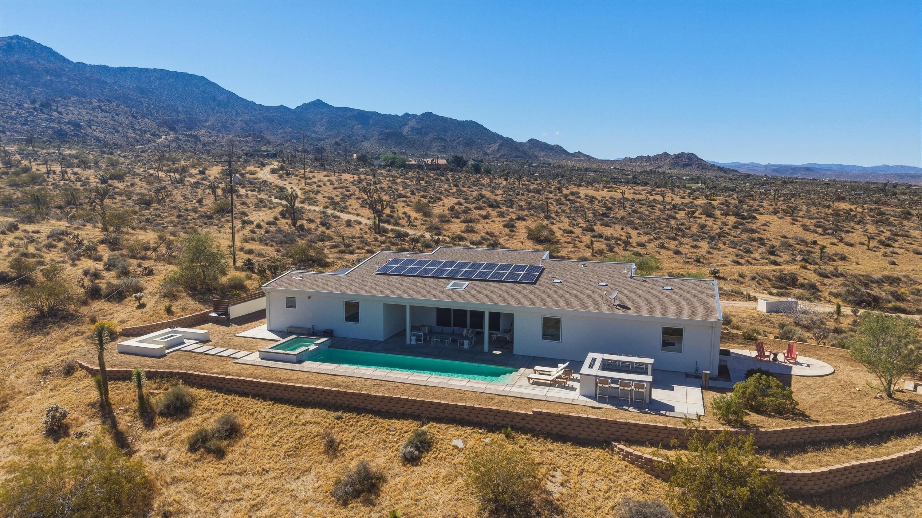 8825 Lilley Road Joshua Tree, CA 92252 - Photo 50 of 56 a view of a house with a mountain