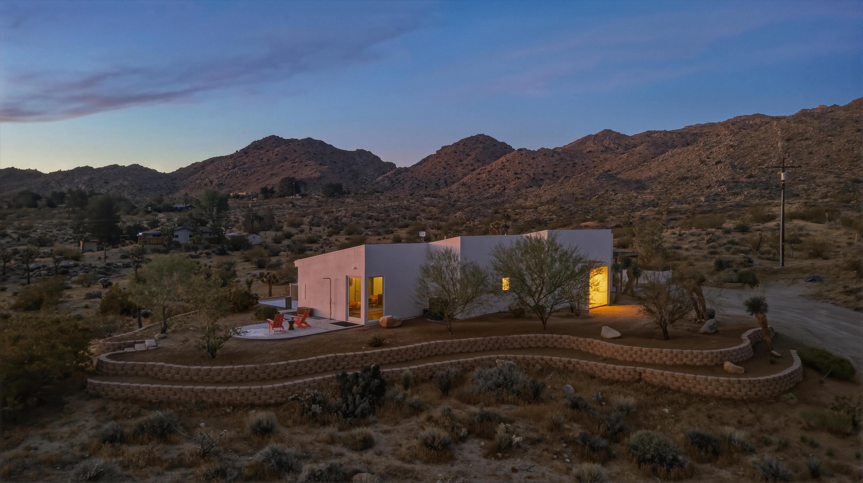 8825 Lilley Road Joshua Tree, CA 92252 - Photo 52 of 56 a view of a street with a mountain in the background