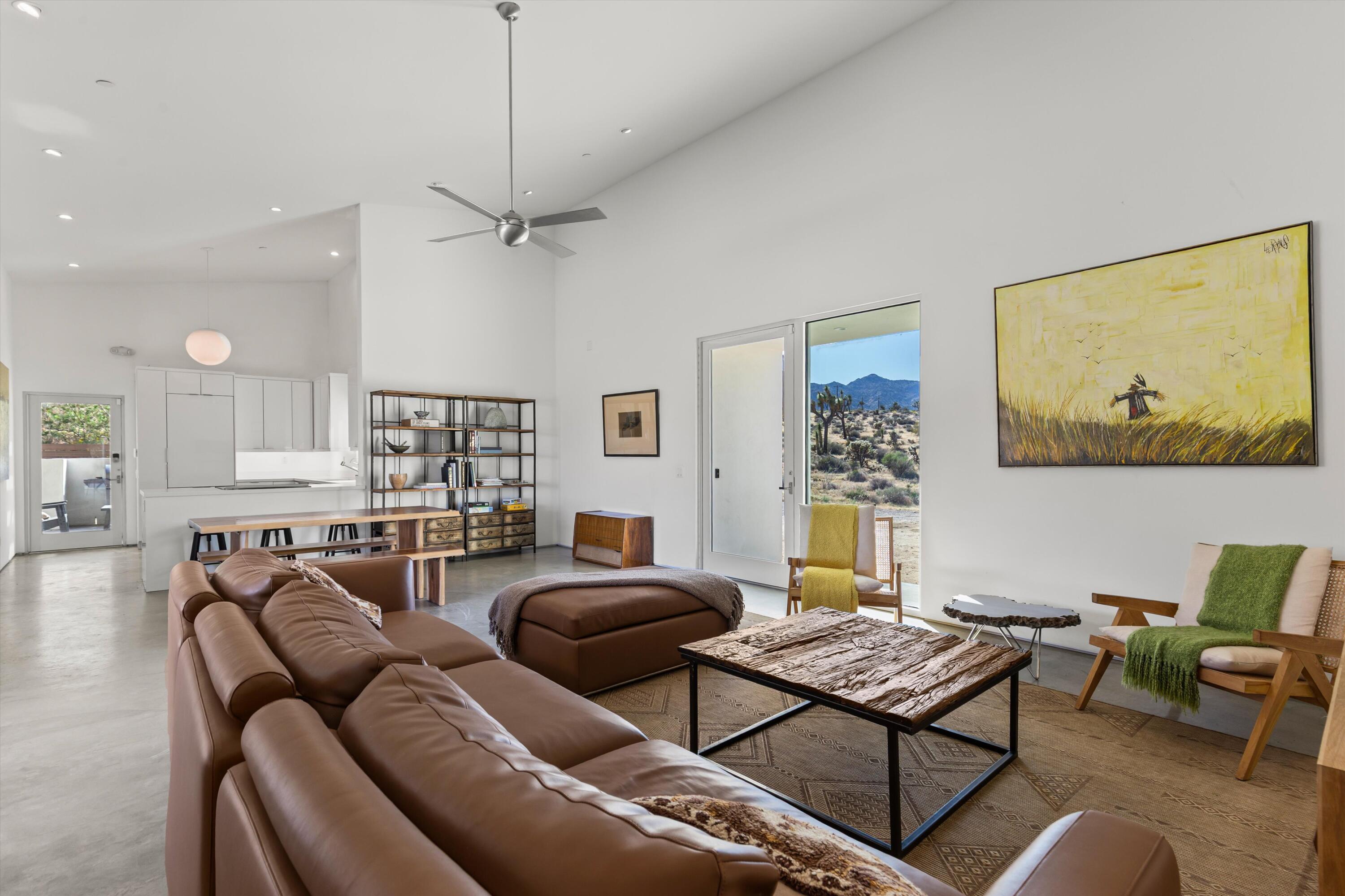 8825 Lilley Road Joshua Tree, CA 92252 - Photo 9 of 56 a living room with furniture and wooden floor