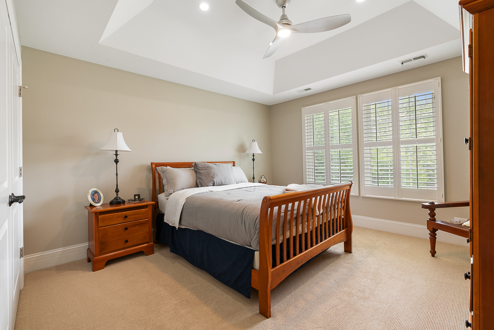 2028 Maple Avenue Northbrook, IL 60062 - Photo 16 of 26 a bed room with a bed and a chair