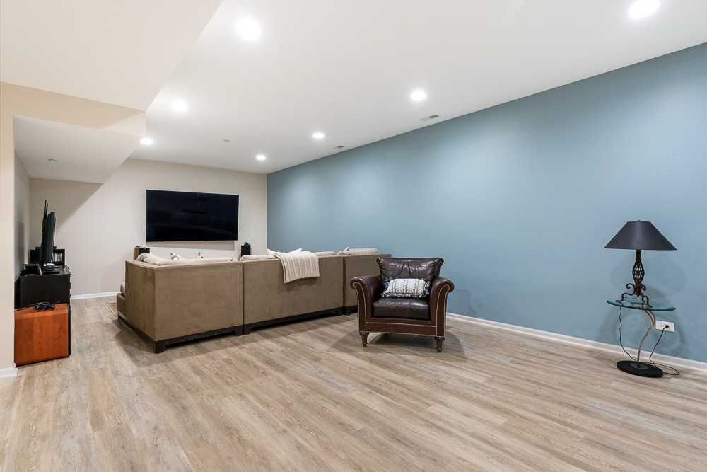 2028 Maple Avenue Northbrook, IL 60062 - Photo 19 of 26 a living room with furniture and a flat screen tv