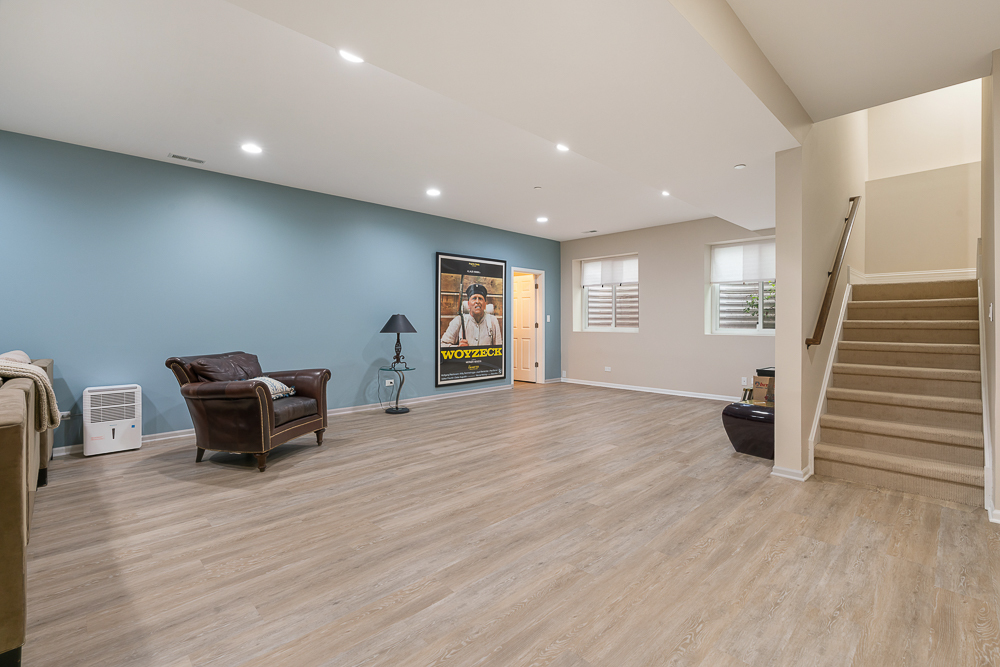 2028 Maple Avenue Northbrook, IL 60062 - Photo 20 of 26 a view of a livingroom with wooden floor and furniture