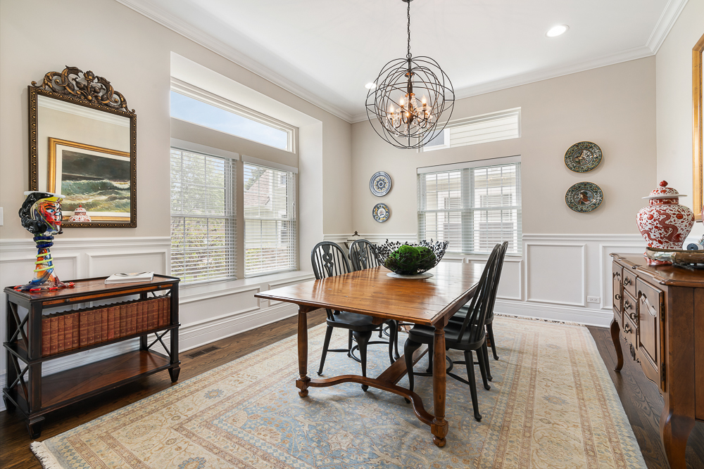 2028 Maple Avenue Northbrook, IL 60062 - Photo 2 of 26 a view of a dining room with furniture window and wooden floor