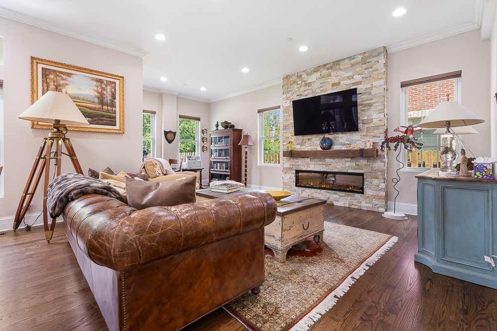 2028 Maple Avenue Northbrook, IL 60062 - Photo 3 of 26 a living room with furniture and a flat screen tv