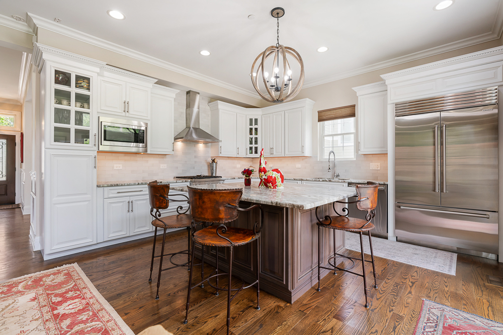 2028 Maple Avenue Northbrook, IL 60062 - Photo 5 of 26 a view of a dining room with furniture window and wooden floor