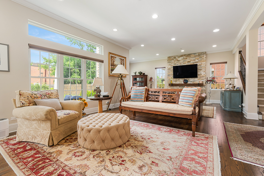 2028 Maple Avenue Northbrook, IL 60062 - Photo 7 of 26 a living room with furniture and a flat screen tv