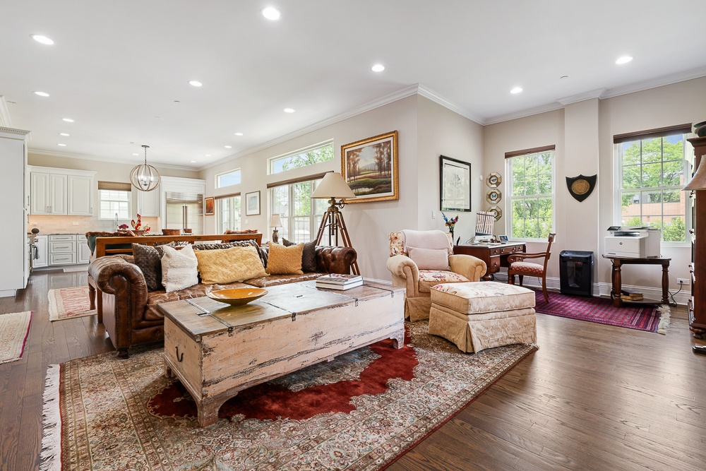 2028 Maple Avenue Northbrook, IL 60062 - Photo 8 of 26 a living room with furniture fireplace and a large window