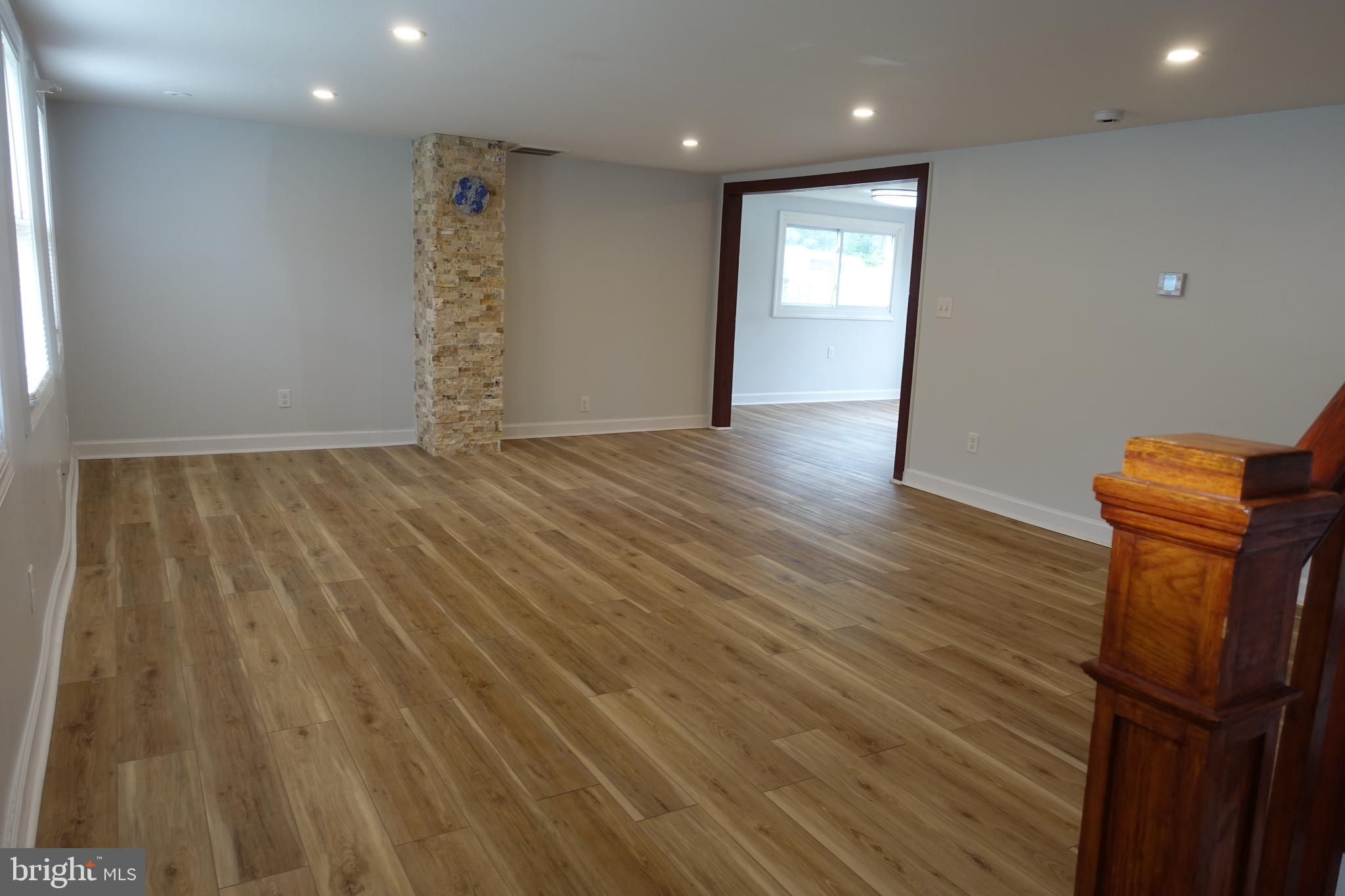 413 Dominion Road Chester, MD 21619 - Photo 7 of 30 Recessed lighting in living room and kitchen