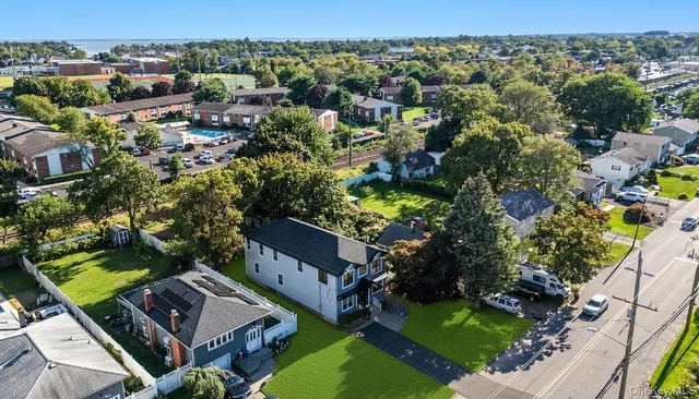 an aerial view of a house with a garden