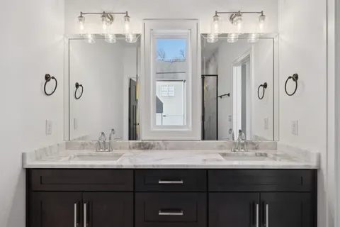 a bathroom with a sink and a mirror