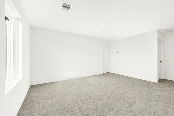 an empty room with a natural light