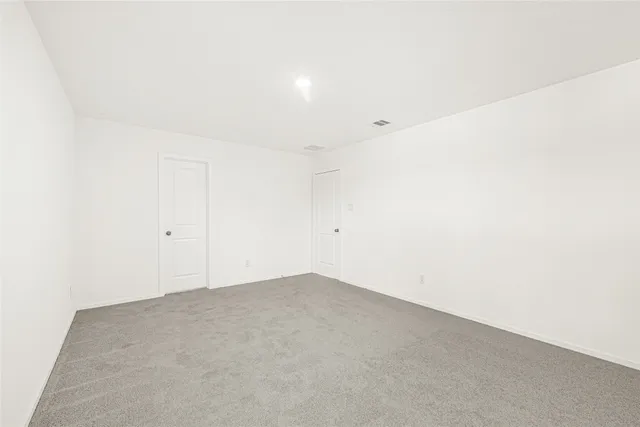 an empty room with an entryway