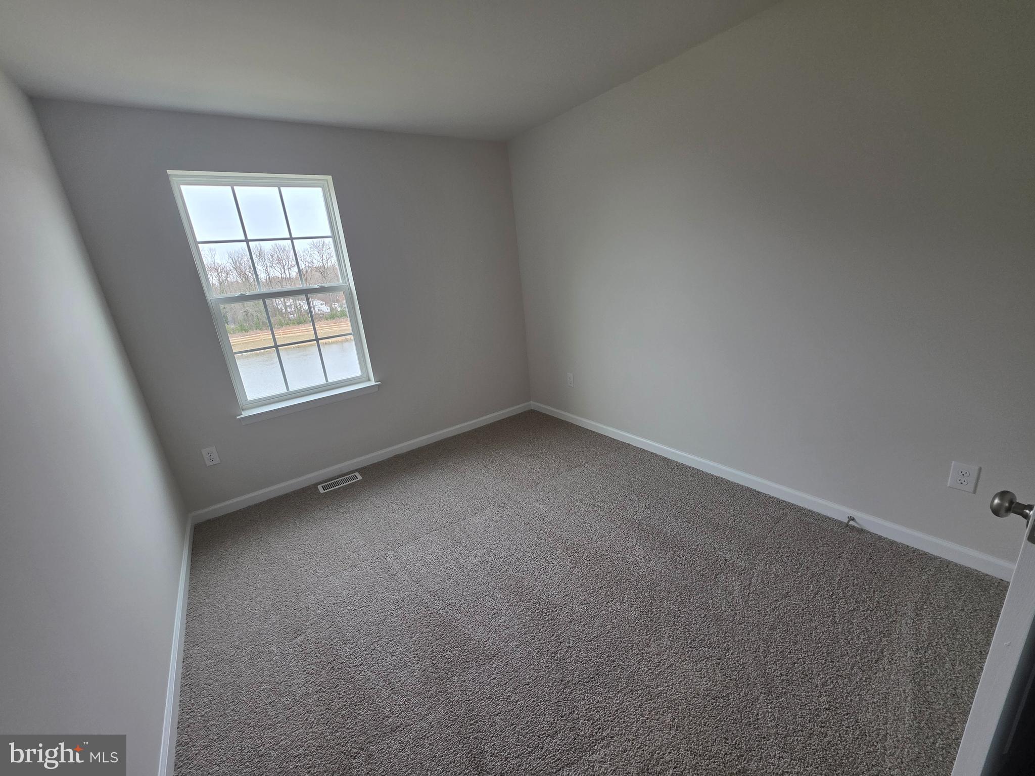 57 Alexander Way Westampton, NJ 08060 - Photo 17 of 27 an empty room with a window
