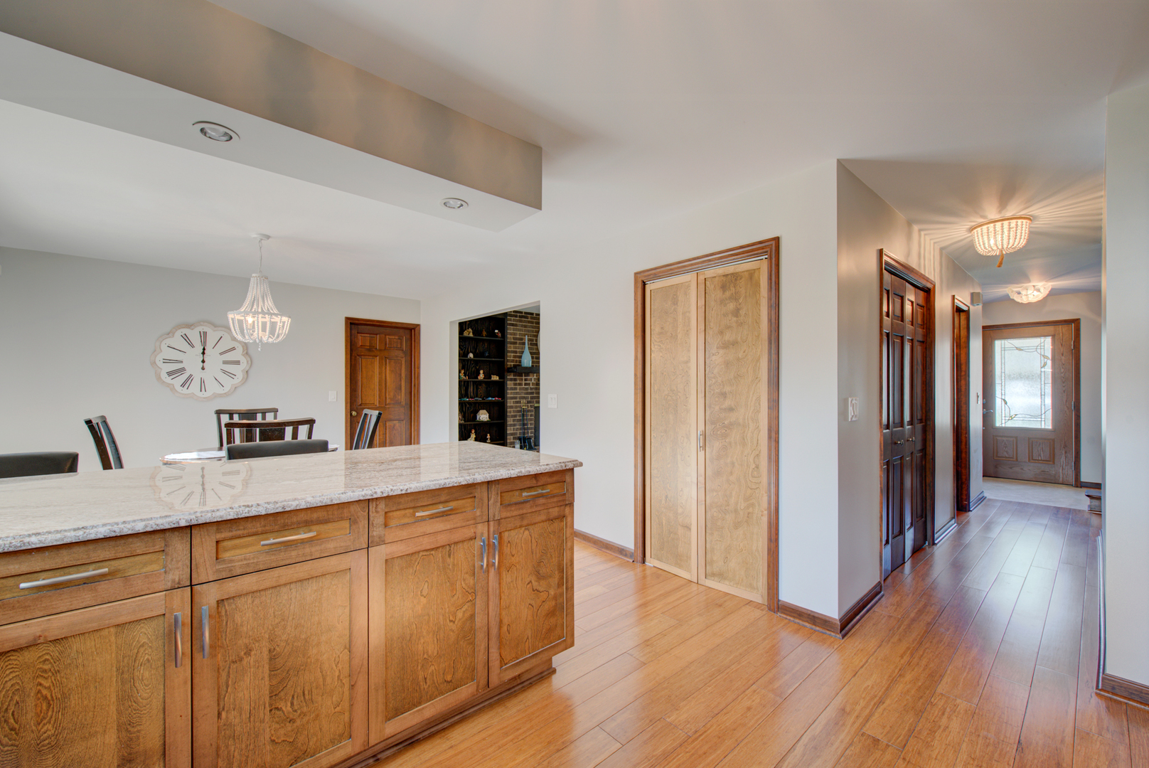 1710 Fender Road Naperville, IL 60565 - Photo 13 of 46 a view of a hallway with wooden floor and cabinet