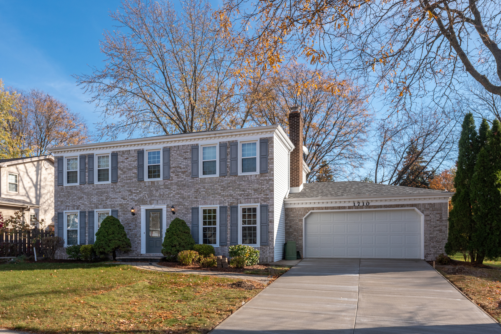 1710 Fender Road Naperville, IL 60565 - Photo 3 of 46 a front view of a house with a yard