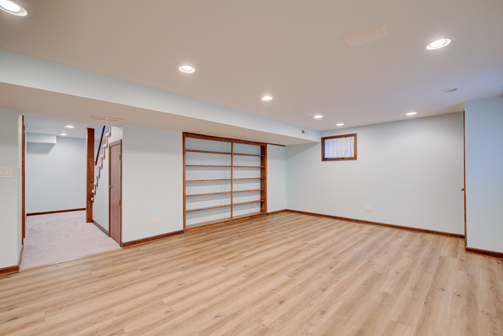 1710 Fender Road Naperville, IL 60565 - Photo 40 of 46 a view of an empty room with wooden floor and closet