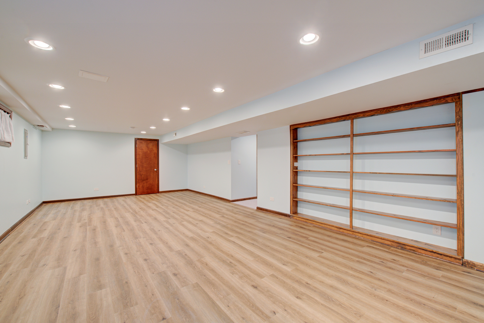 1710 Fender Road Naperville, IL 60565 - Photo 41 of 46 a view of empty room with wooden floor and window