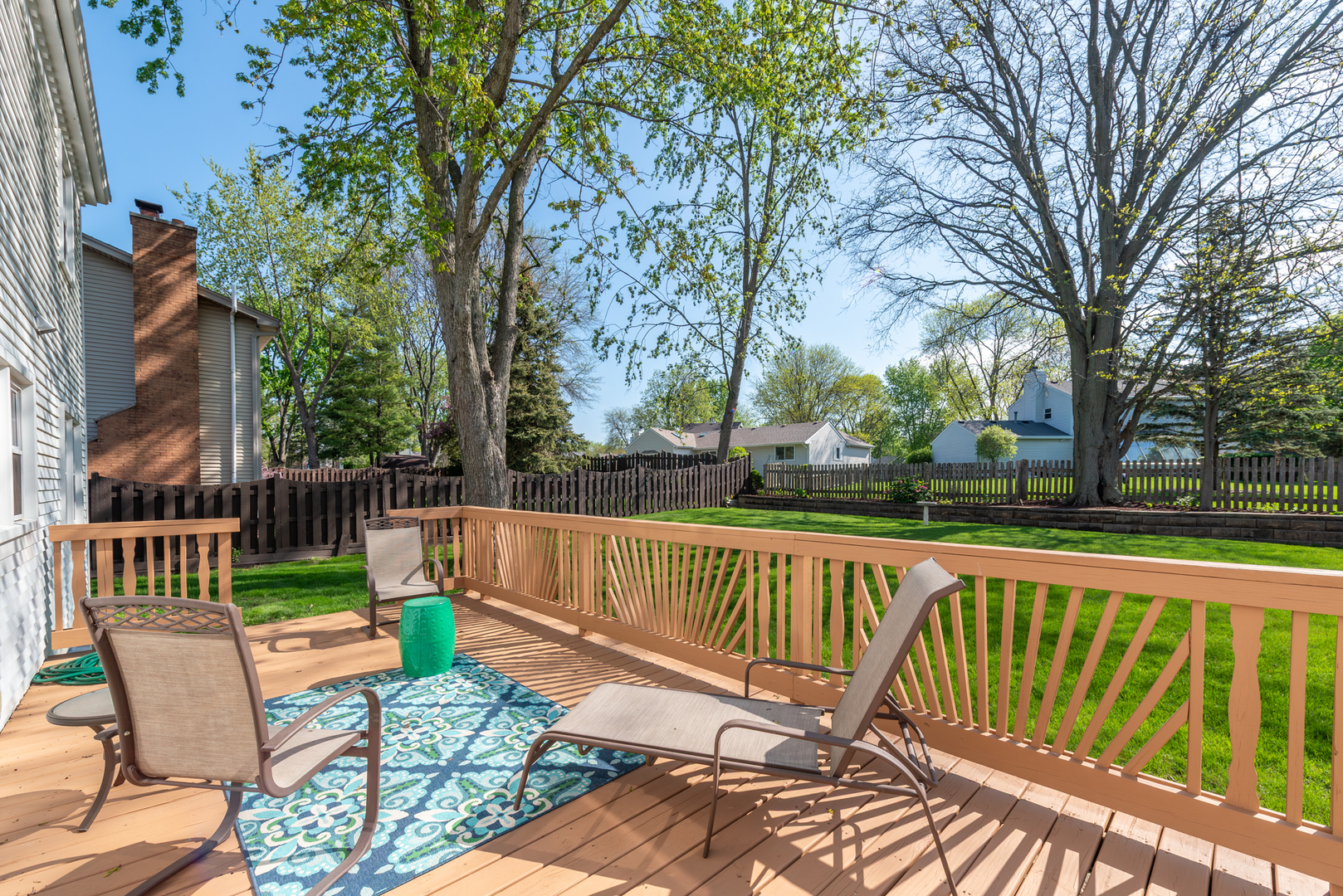1710 Fender Road Naperville, IL 60565 - Photo 42 of 46 a view of a chair and table on the deck