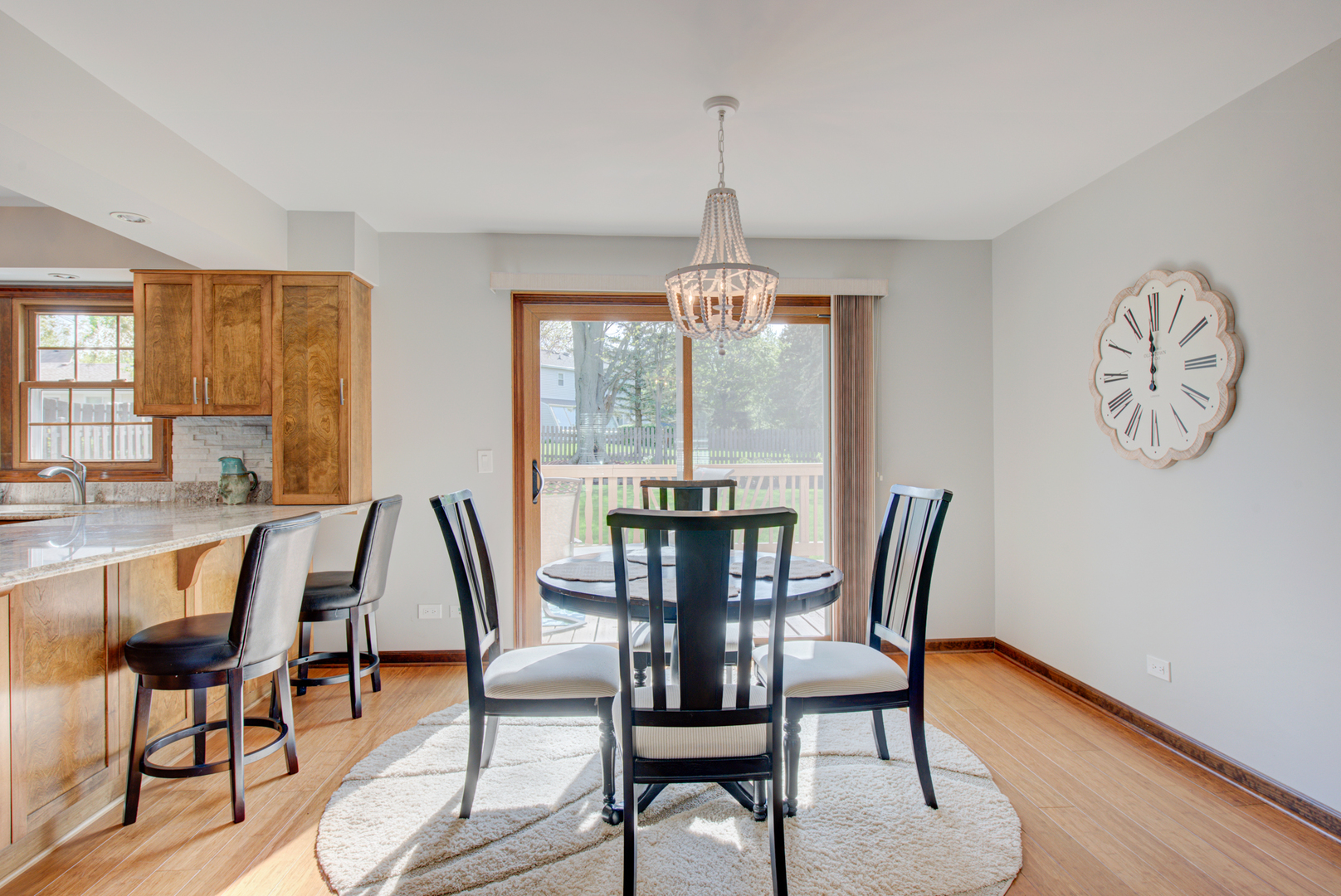 1710 Fender Road Naperville, IL 60565 - Photo 8 of 46 a view of a dining room with furniture window and wooden floor