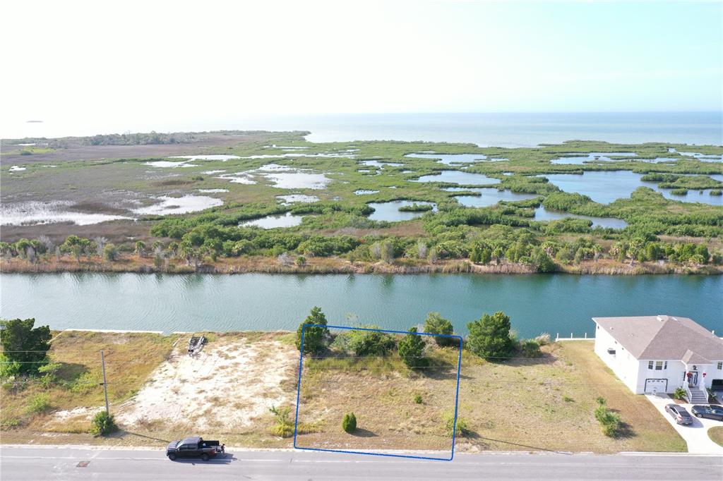 Lugustrum Drive Hernando Beach, FL 34607 - Photo 3 of 8 a view of a city and an ocean view