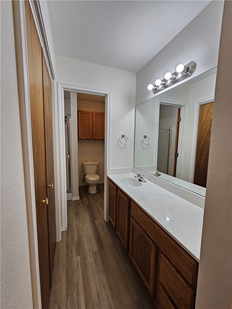 3121 Lenore Avenue Ingleside, TX 78362 - Photo 16 of 24 a large bathroom with a double vanity sink and a mirror