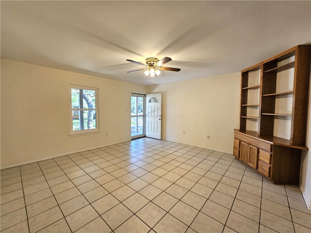 3121 Lenore Avenue Ingleside, TX 78362 - Photo 5 of 24 a view of an empty room with a window