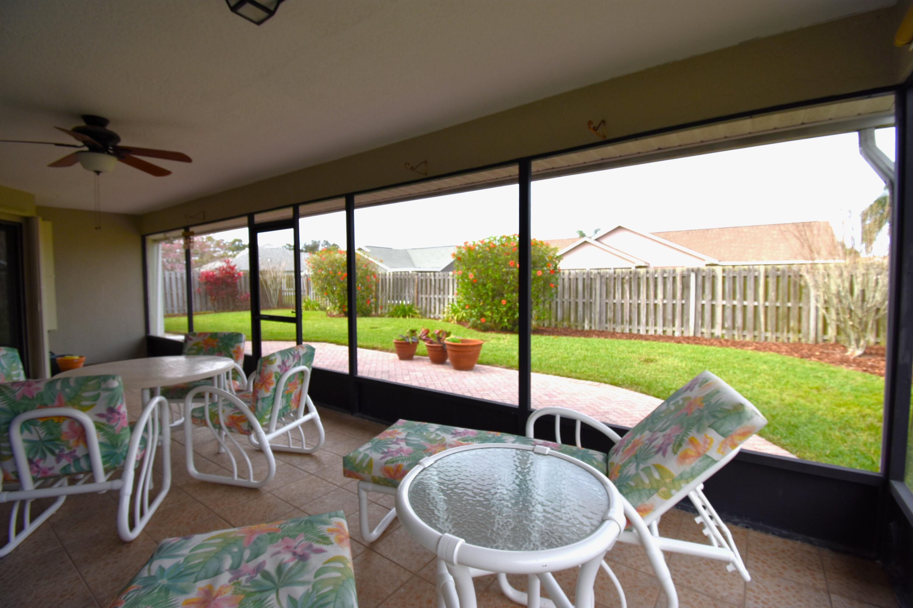 1920 Glen Meadows Circle Melbourne, FL 32935 - Photo 17 of 19 a dining room with furniture water view and wooden floor