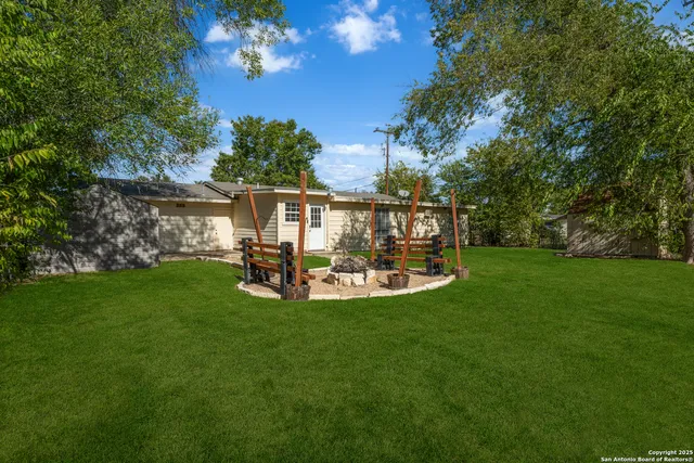 a view of a swimming pool with a garden