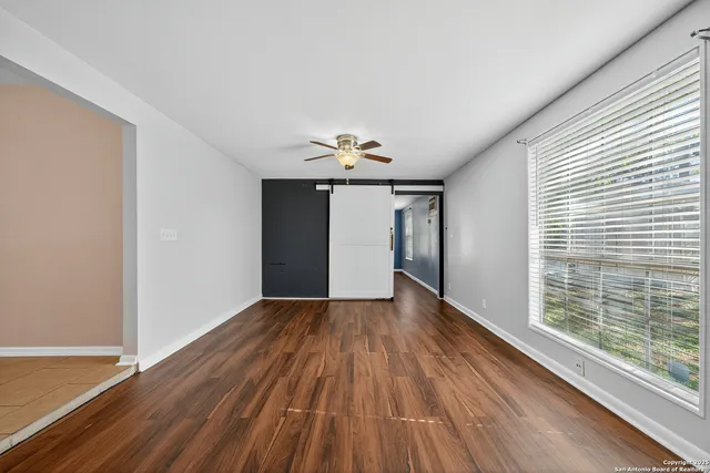 a view of entryway with wooden floor