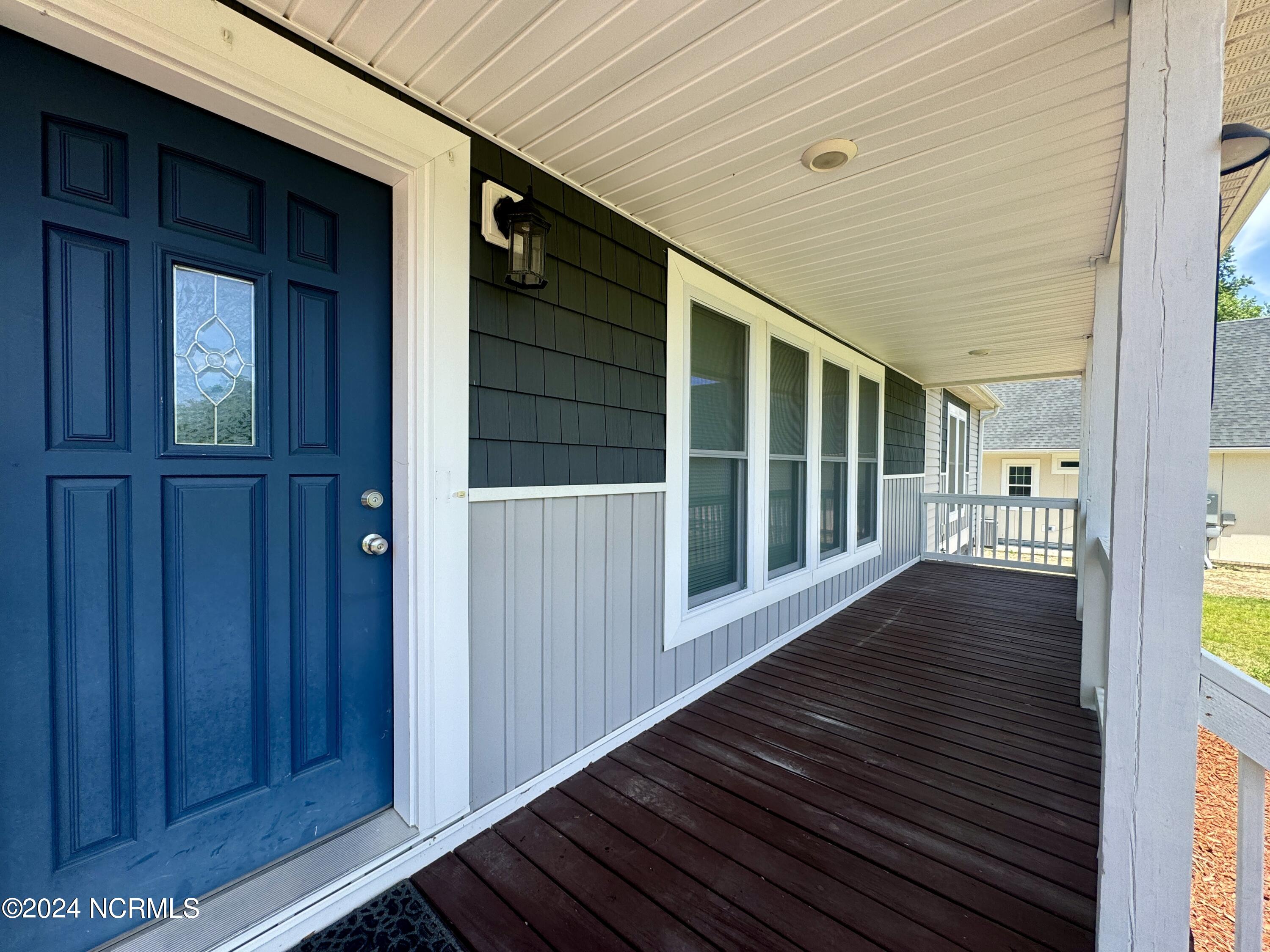 114 Quilt Road Southwest Supply, NC 28462 - Photo 5 of 45 Front porch