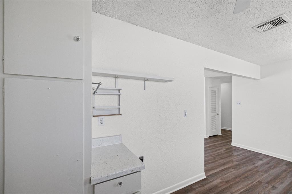 500 Highway 22 Meridian, TX 76665 - Photo 14 of 28 a view of walk in closet with wooden floor