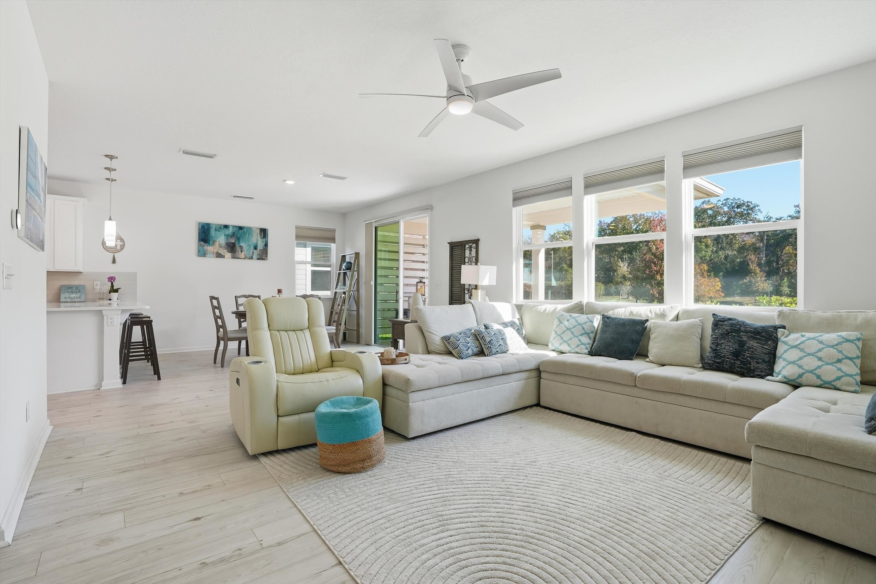 358 Rambling Brk Trail St. Johns, FL 32259 - Photo 11 of 39 a living room with furniture and a large window