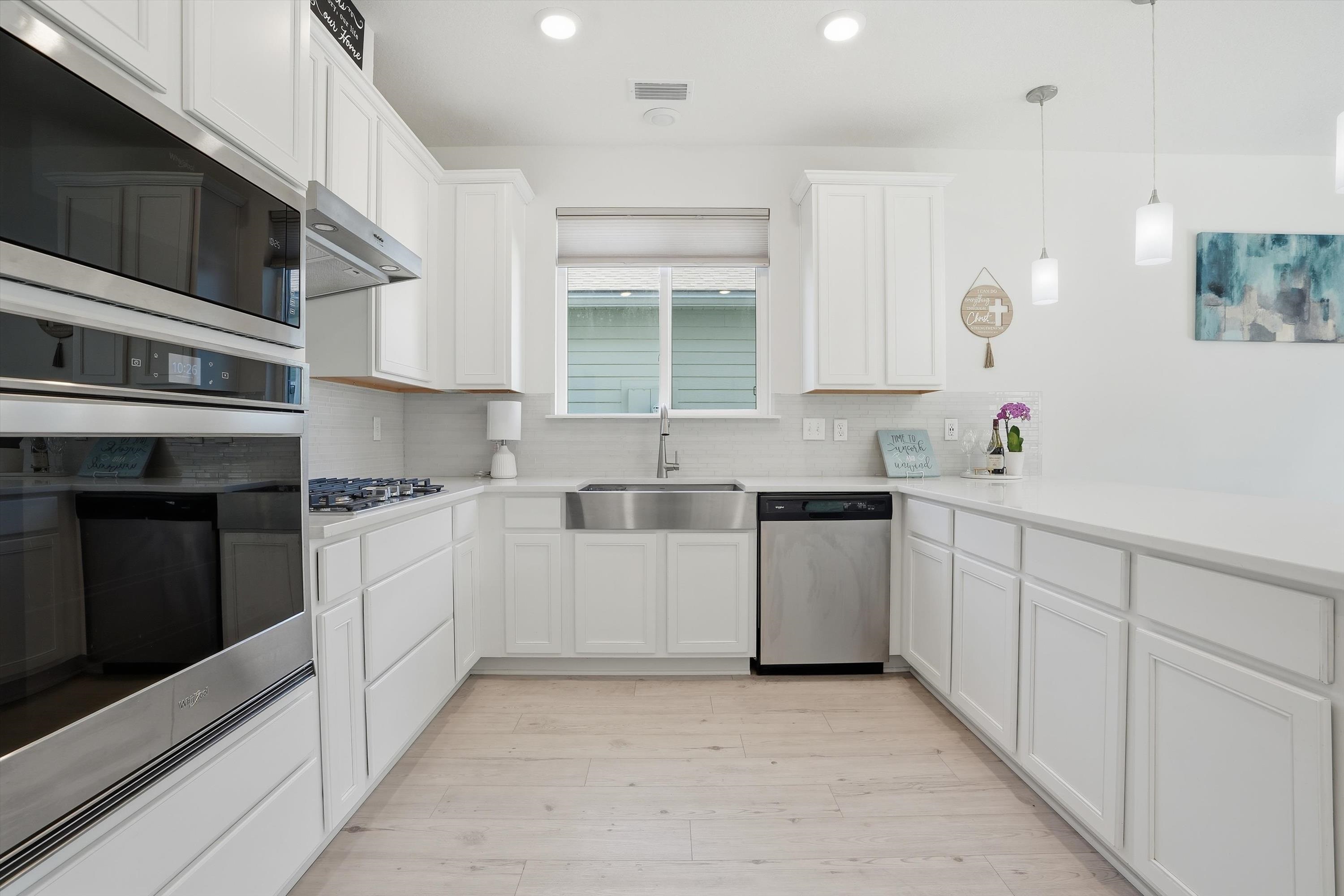 358 Rambling Brk Trail St. Johns, FL 32259 - Photo 14 of 39 a kitchen with granite countertop white cabinets and white appliances