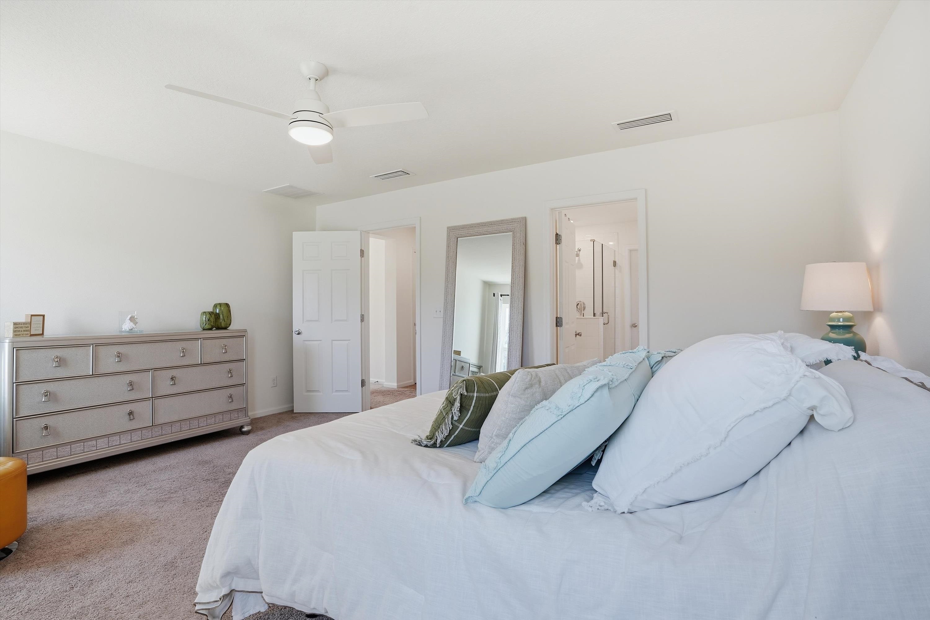 358 Rambling Brk Trail St. Johns, FL 32259 - Photo 18 of 39 a bedroom with a bed and a dresser