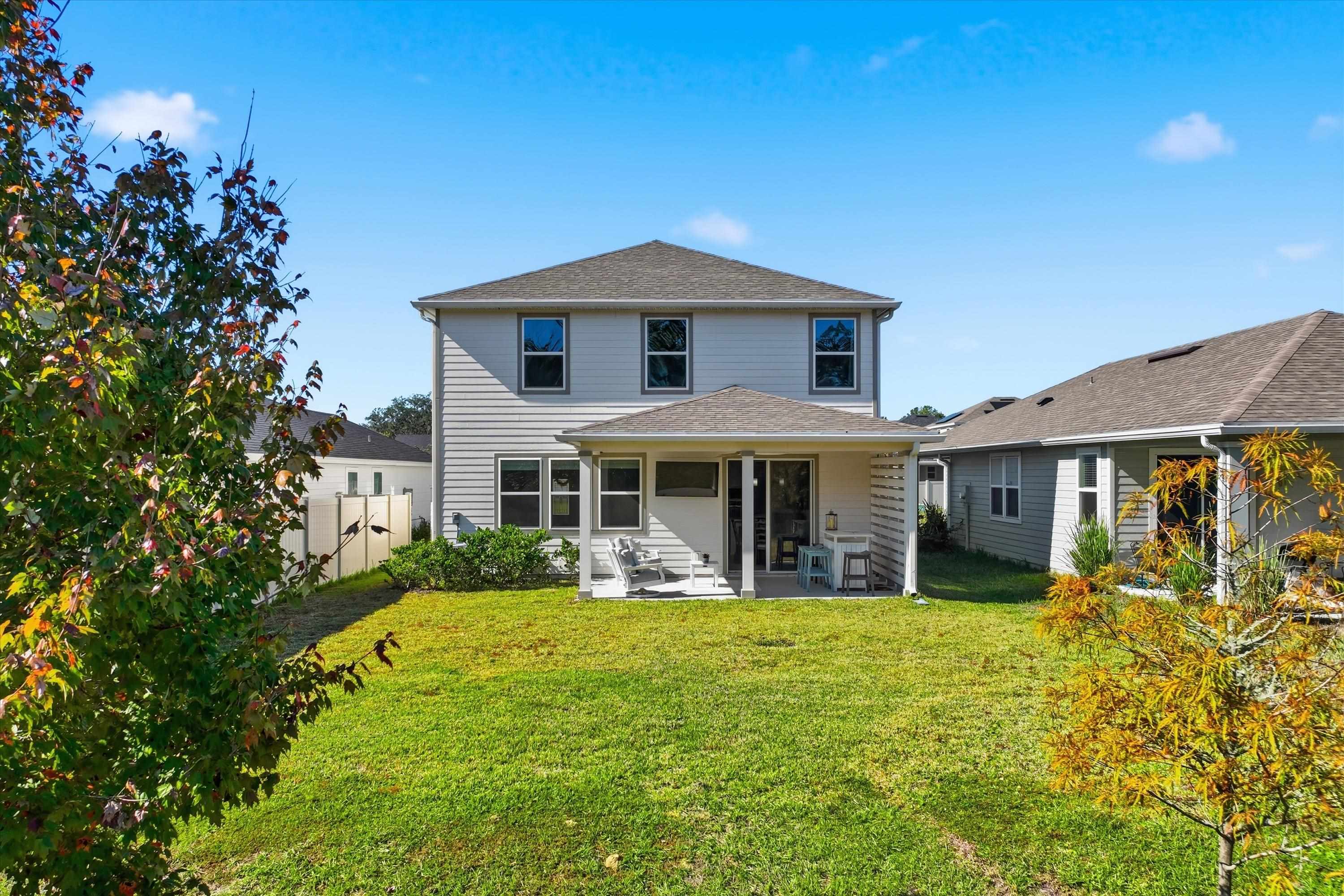 358 Rambling Brk Trail St. Johns, FL 32259 - Photo 29 of 39 a front view of a house with a yard
