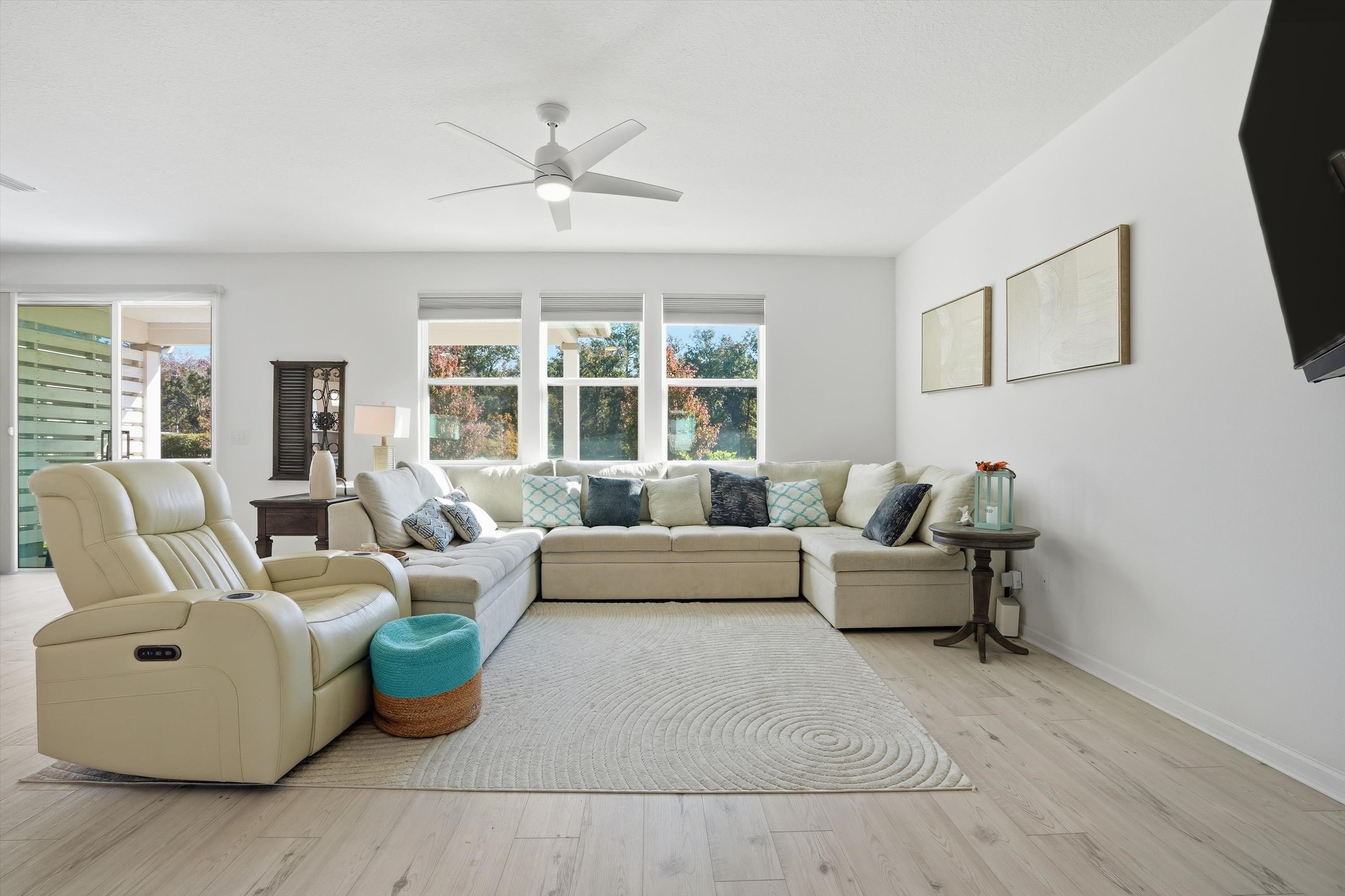 358 Rambling Brk Trail St. Johns, FL 32259 - Photo 9 of 39 a living room with furniture and a large window