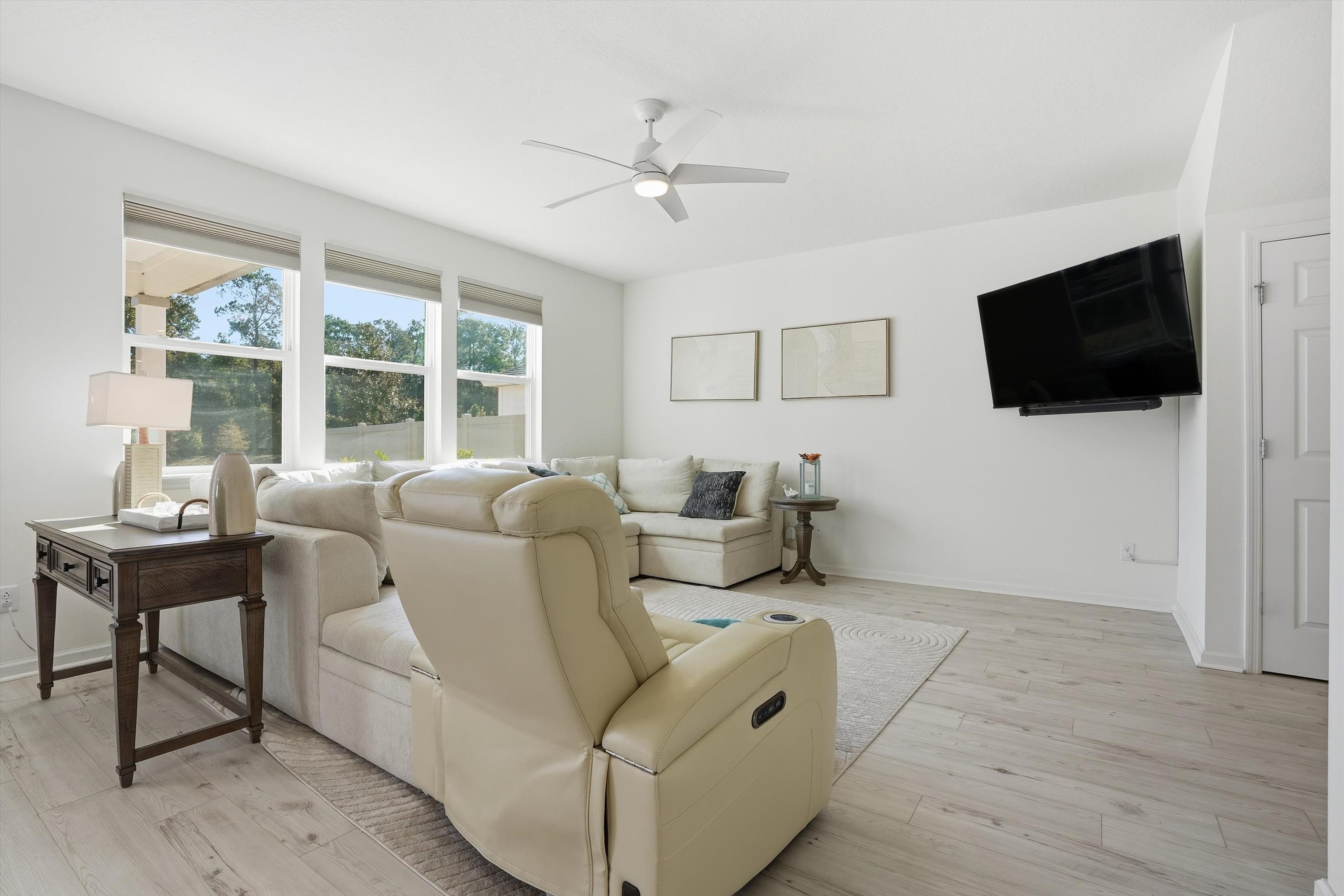 358 Rambling Brk Trail St. Johns, FL 32259 - Photo 10 of 39 a living room with furniture and a flat screen tv