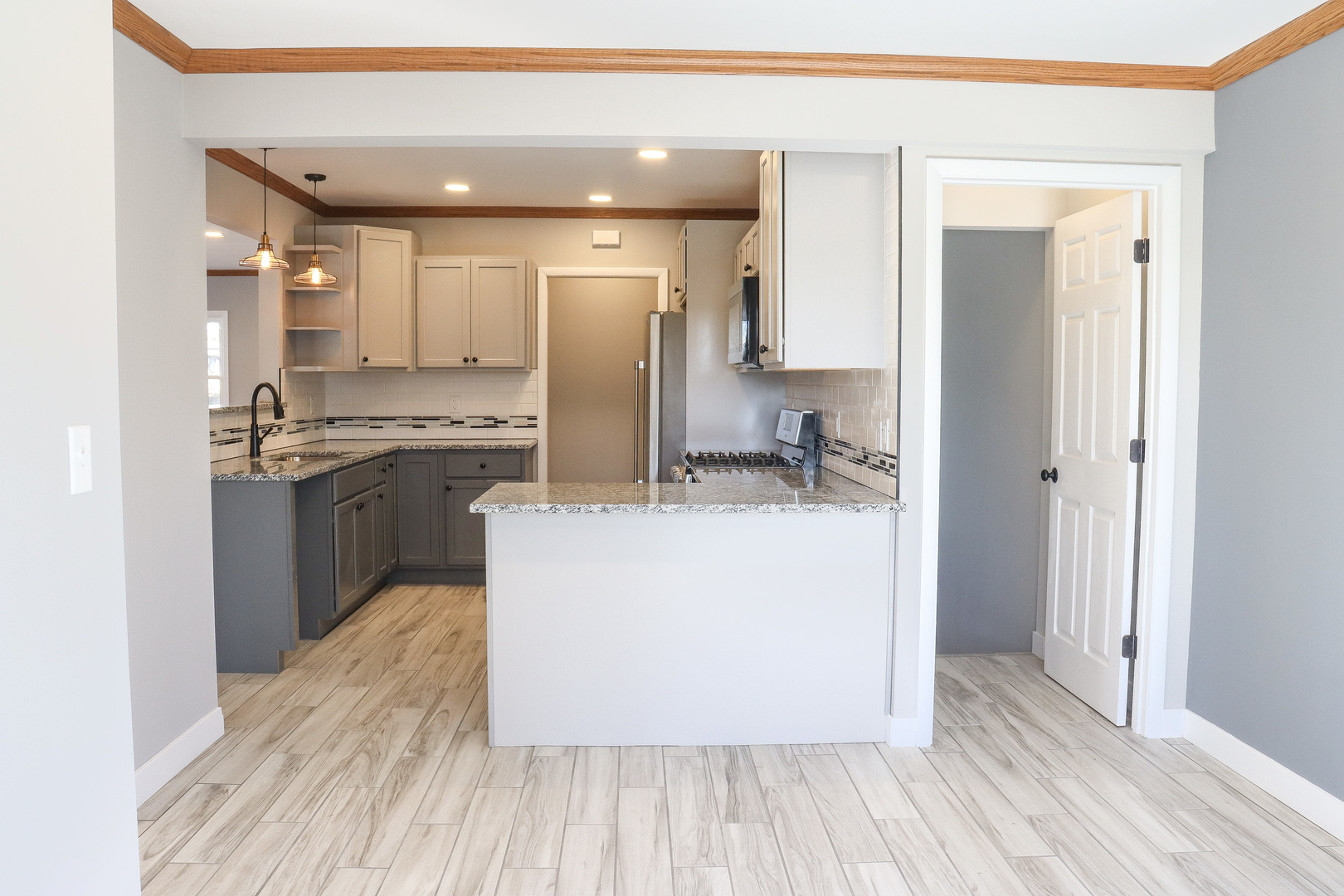 15875 Timberlane Morrison, IL 61270 - Photo 11 of 33 a kitchen with stainless steel appliances granite countertop a refrigerator a sink and a stove