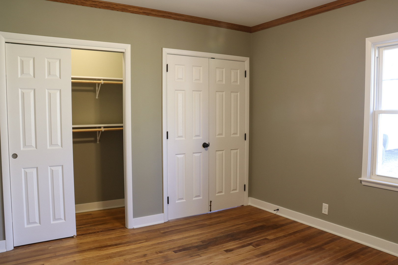 15875 Timberlane Morrison, IL 61270 - Photo 14 of 33 a view of an empty room with wooden floor and a window