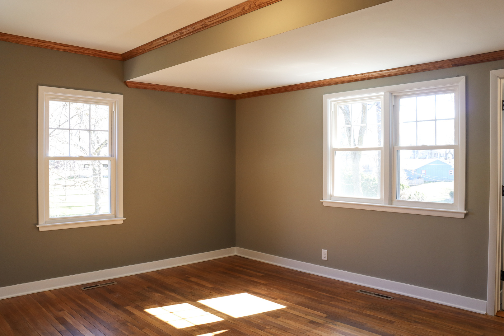 15875 Timberlane Morrison, IL 61270 - Photo 19 of 33 a view of an empty room with wooden floor and a window