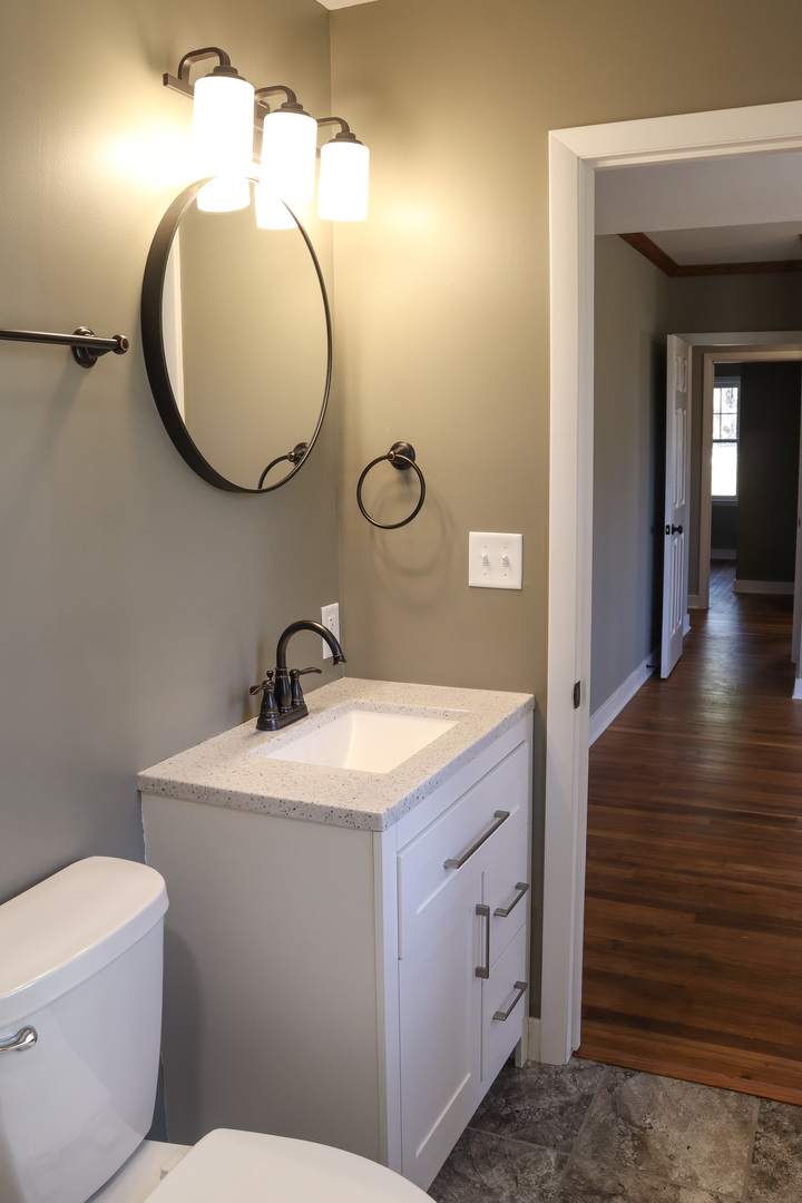 15875 Timberlane Morrison, IL 61270 - Photo 21 of 33 a en suite bathroom with a toilet sink and mirror