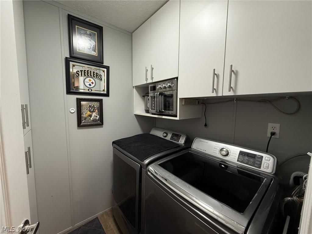 10252 Wellman Road, Unit 19 Streetsboro, OH 44241 - Photo 12 of 12 Laundry room with newer built in cabinets