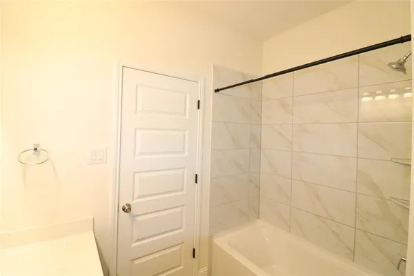 a bathroom with a bathtub