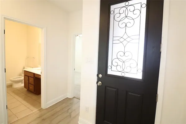 a view of entryway with wooden floor
