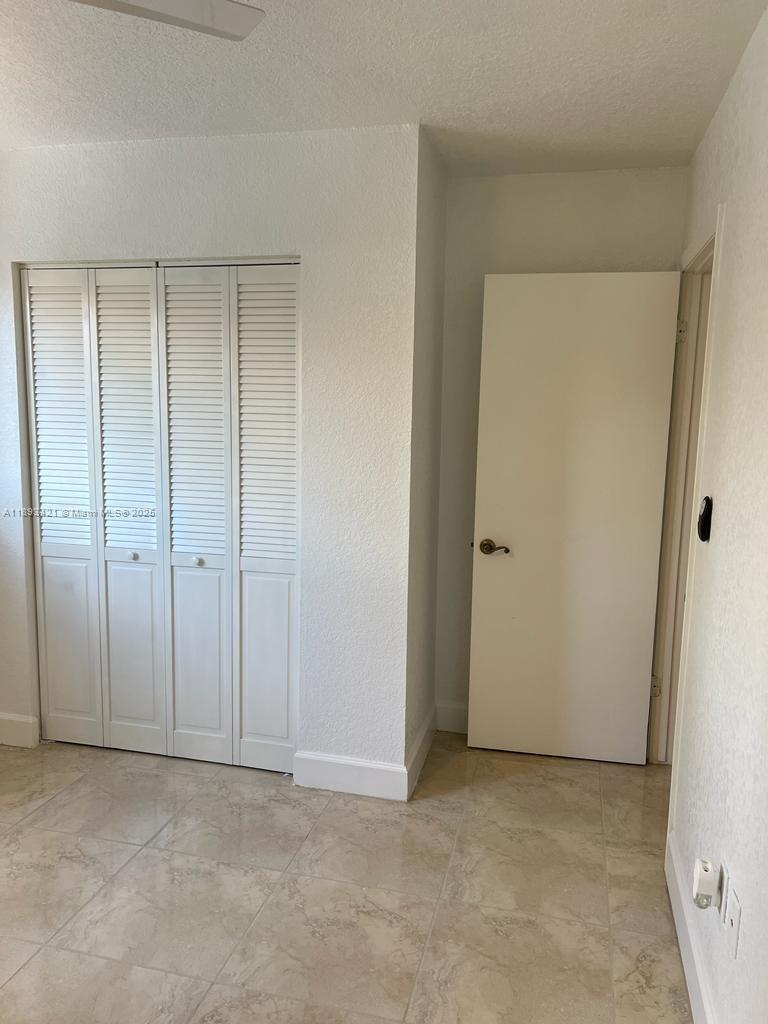 2670 West 76th Street, Unit 101 Hialeah, FL 33016 - Photo 14 of 35 a view of an empty room