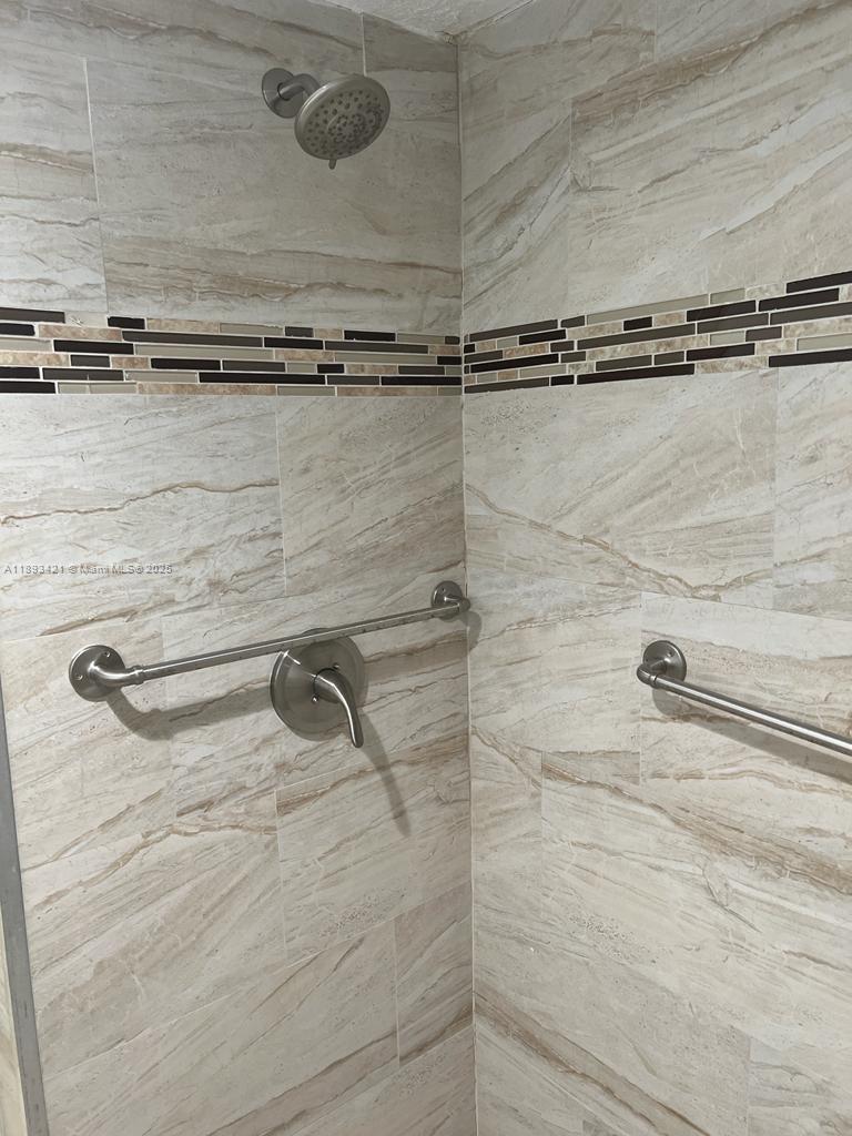 2670 West 76th Street, Unit 101 Hialeah, FL 33016 - Photo 19 of 35 a bathroom with a shower