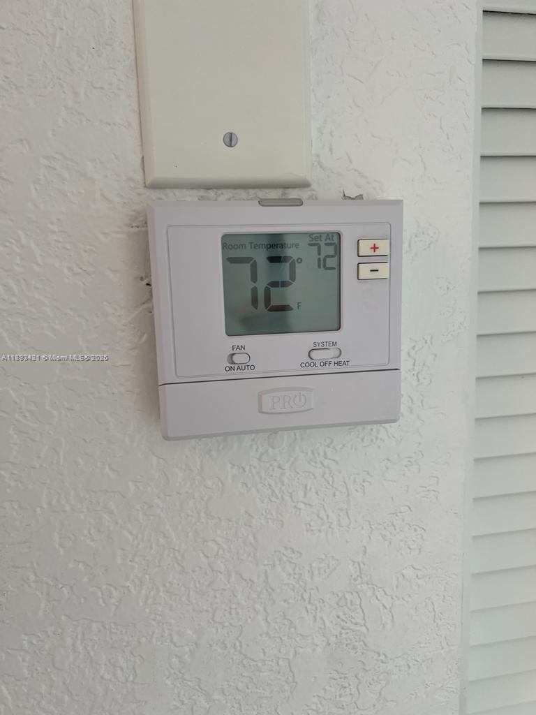 2670 West 76th Street, Unit 101 Hialeah, FL 33016 - Photo 27 of 35 a close view of fireplace